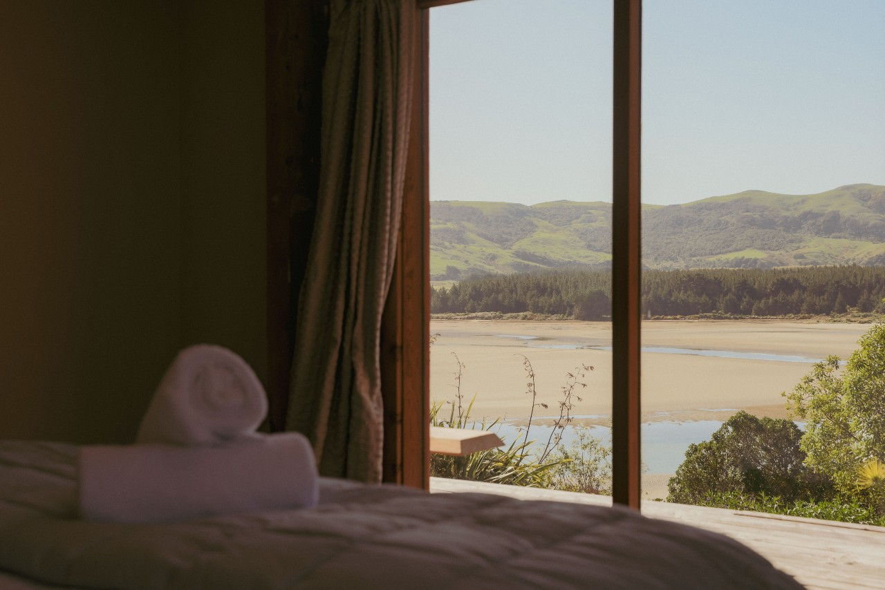 cabin master bedroom view of estuary